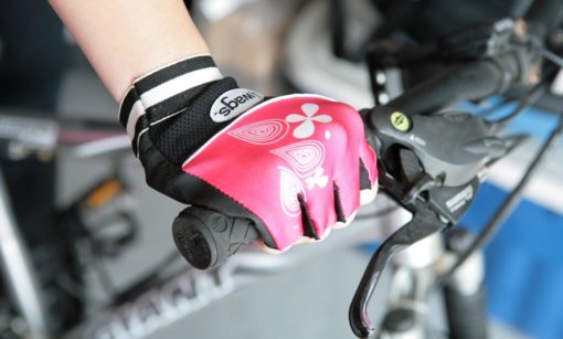 bicycler wearing WAGs Flex fitness gloves